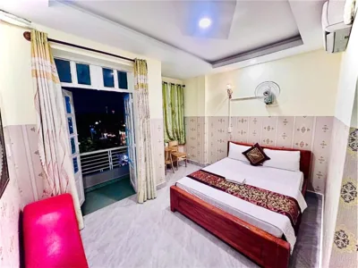 Habitación doble deluxe con balcón — Như Quỳnh Hotel HCM